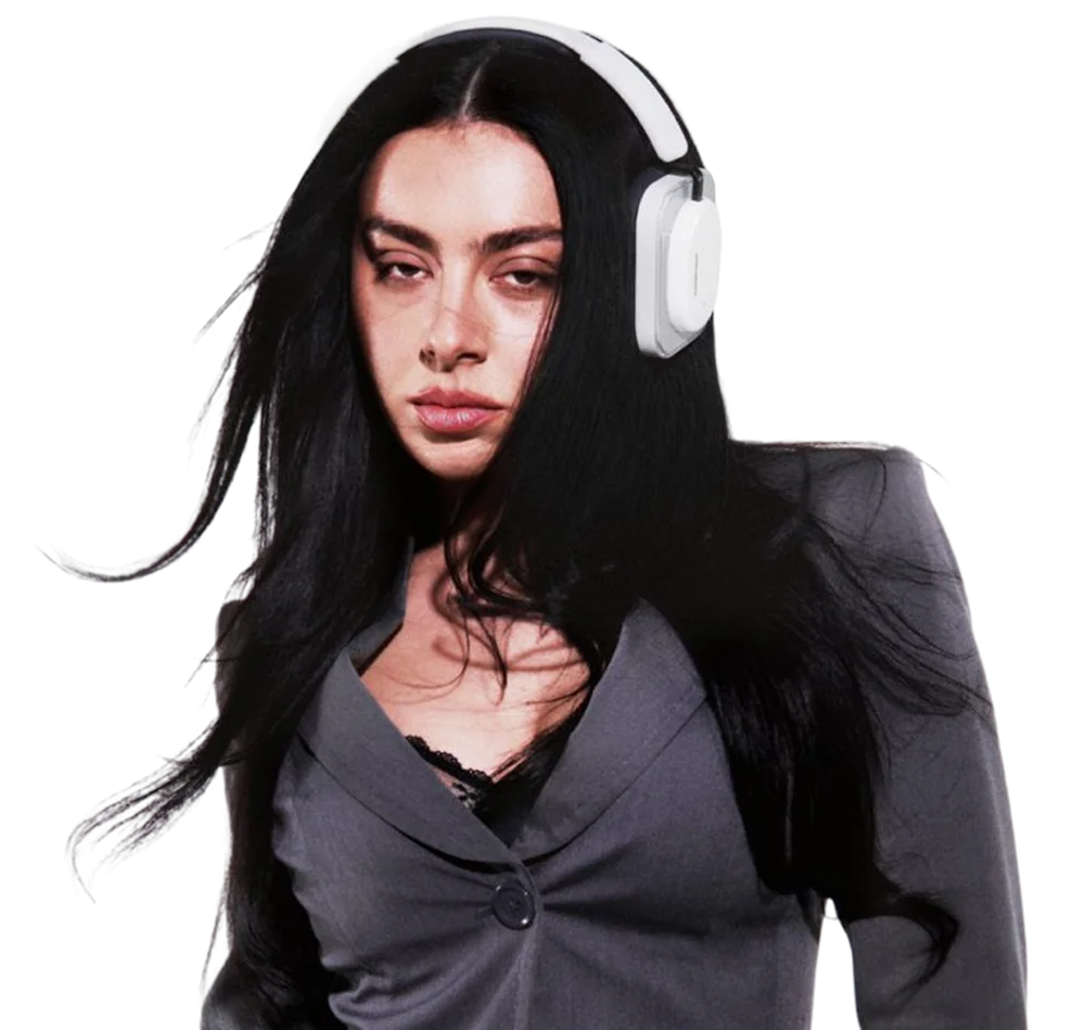 Woman wearing headphones working from the cafe