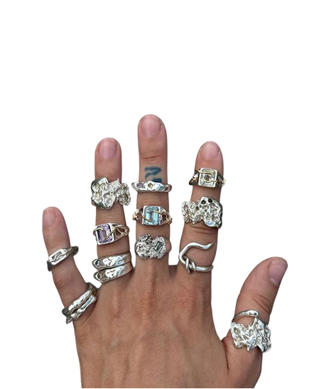 Hand wearing rings